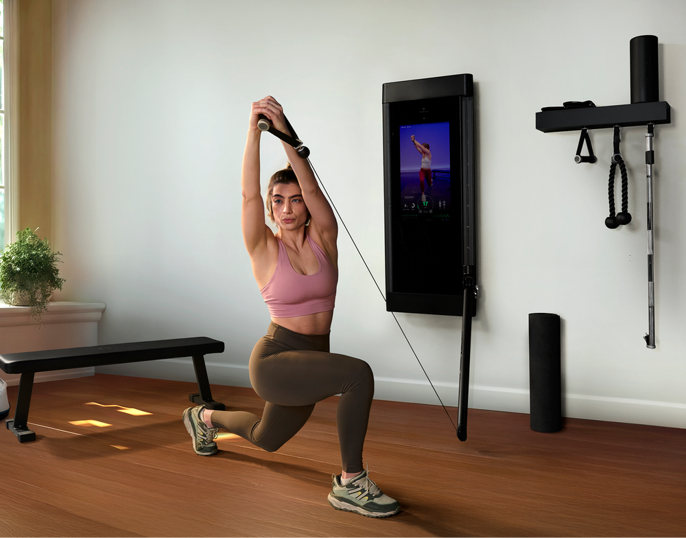 Female doing an Iso Split Lift in home