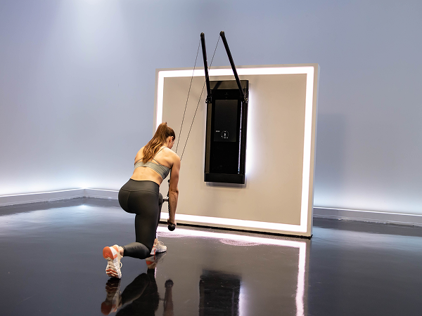 Tonal instructor doing aero lunge